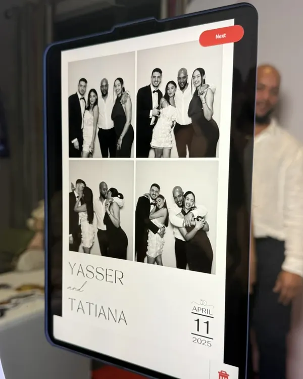 Guests using the digital photo booth at a Miami event